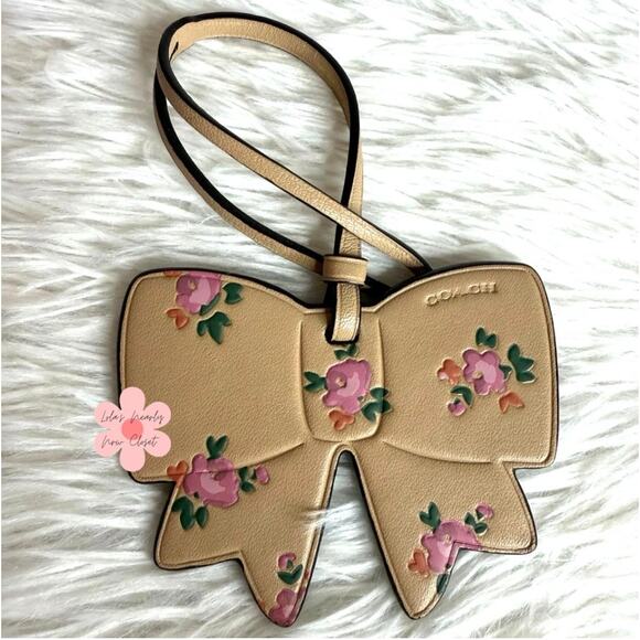 Coach Handbags - Coach Bow Floral Printed Tan Leather Bag Charm Fob
